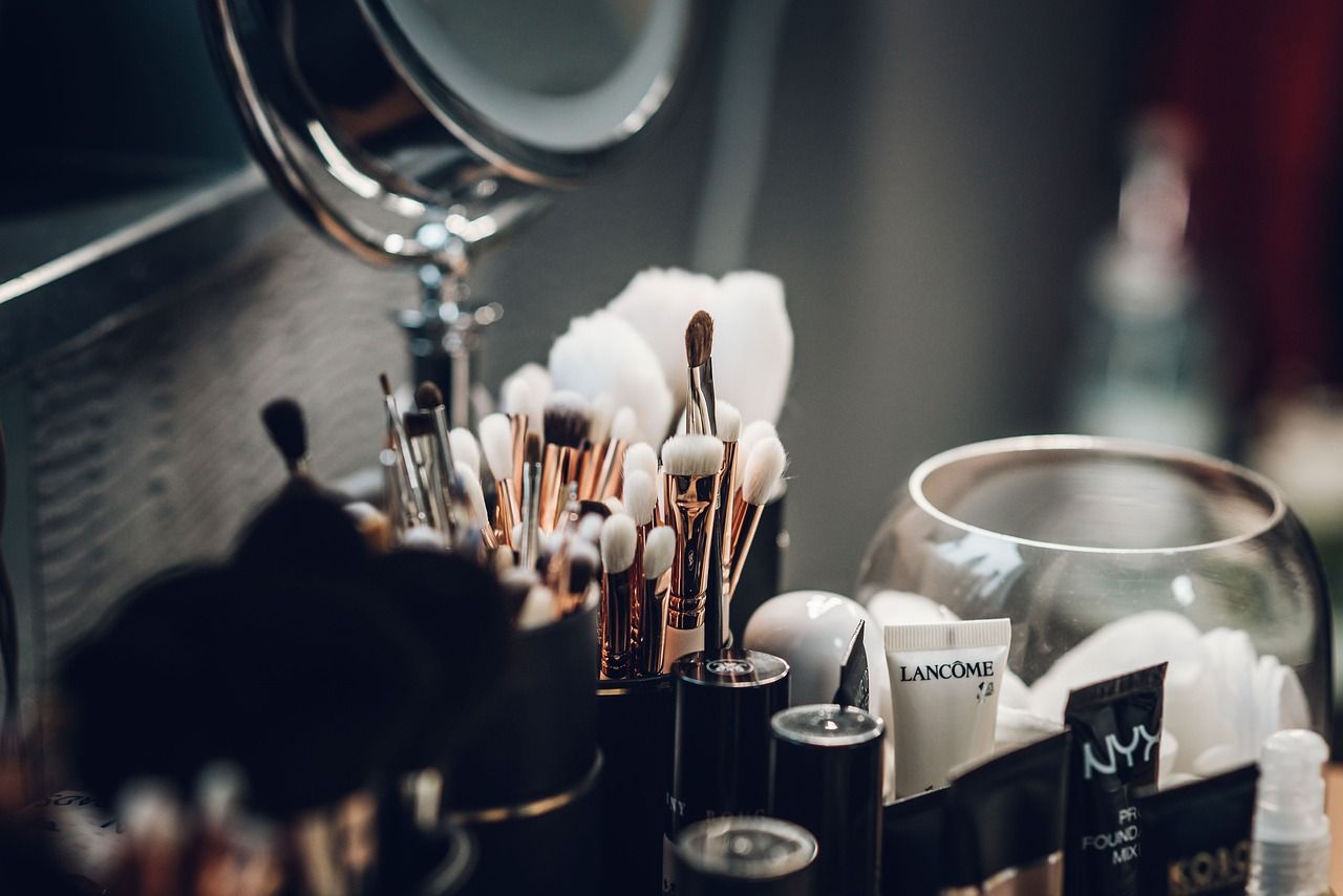 makeup brushes tools workspace flatlay
