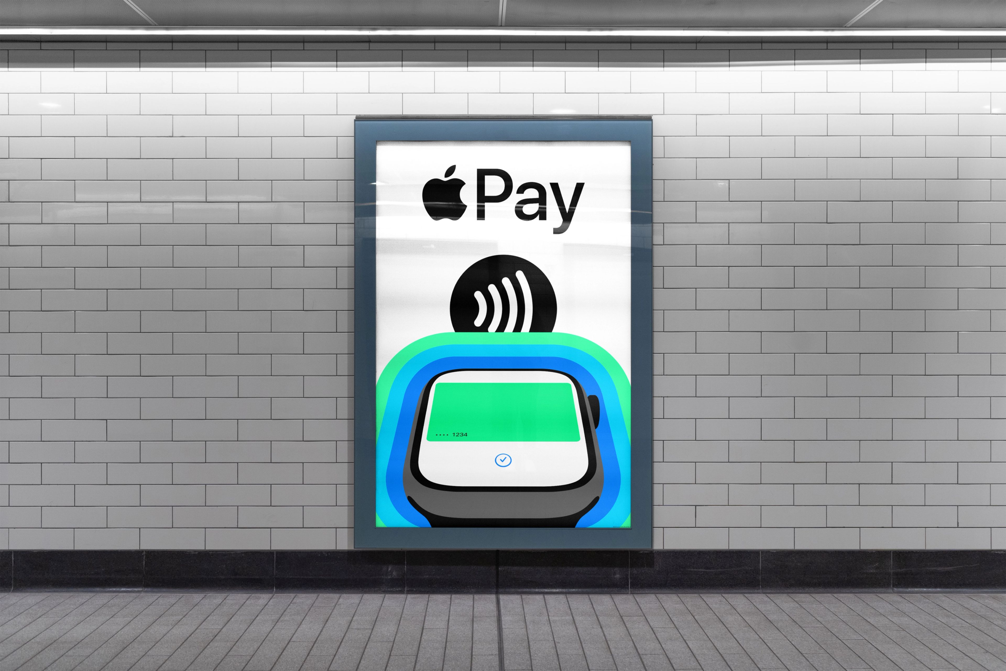 Apple Pay poster on a white tiled wall: the logo, the contactless mark and a card being tapped.