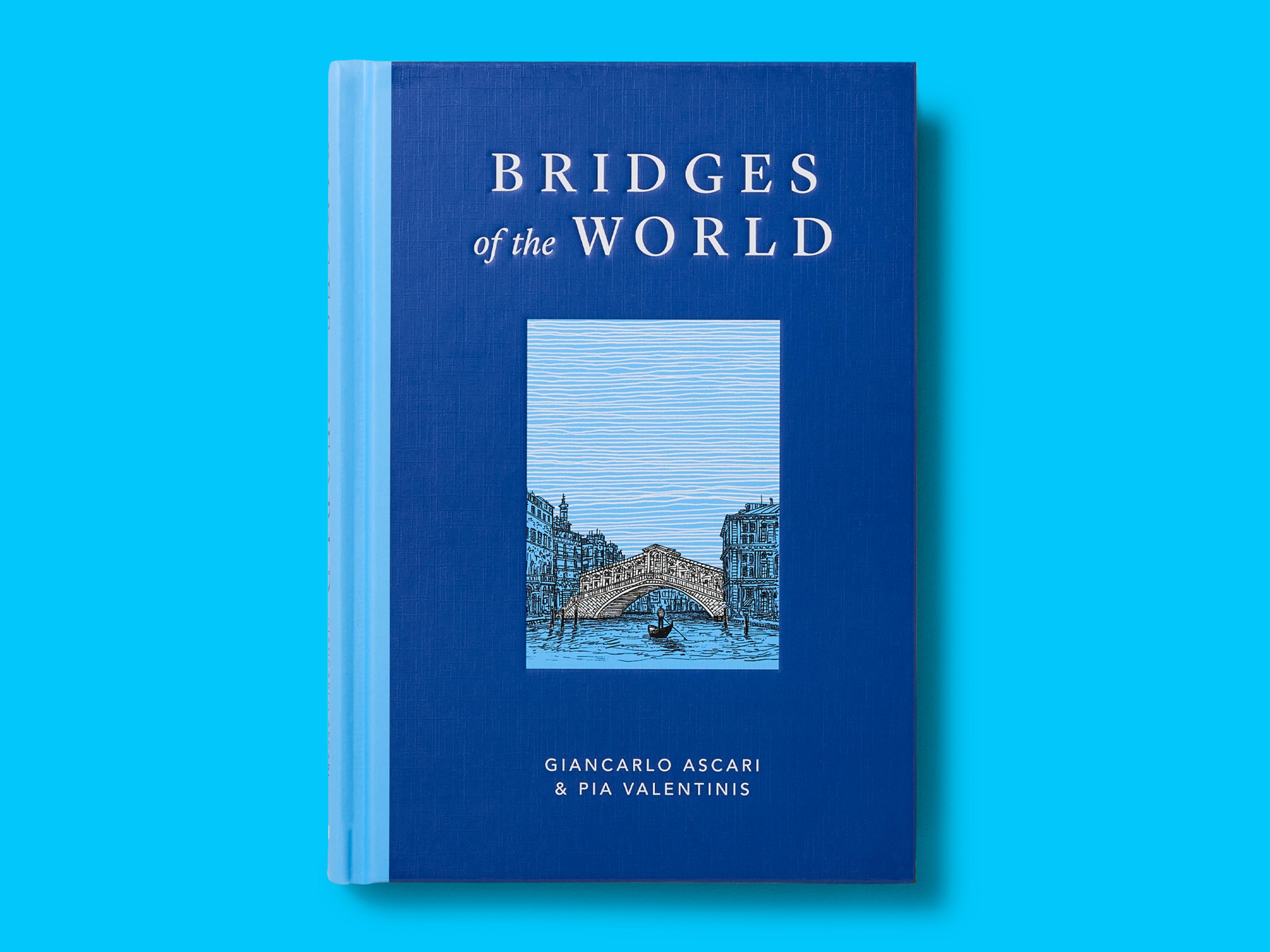 Book titled "Bridges of the World" on a bright cyan background, with a deep blue cloth-textured cover and a central illustrated panel of a stone bridge over water. Title appears in white serif type, with authors Giancarlo Ascari and Pia Valentinis listed at the bottom.