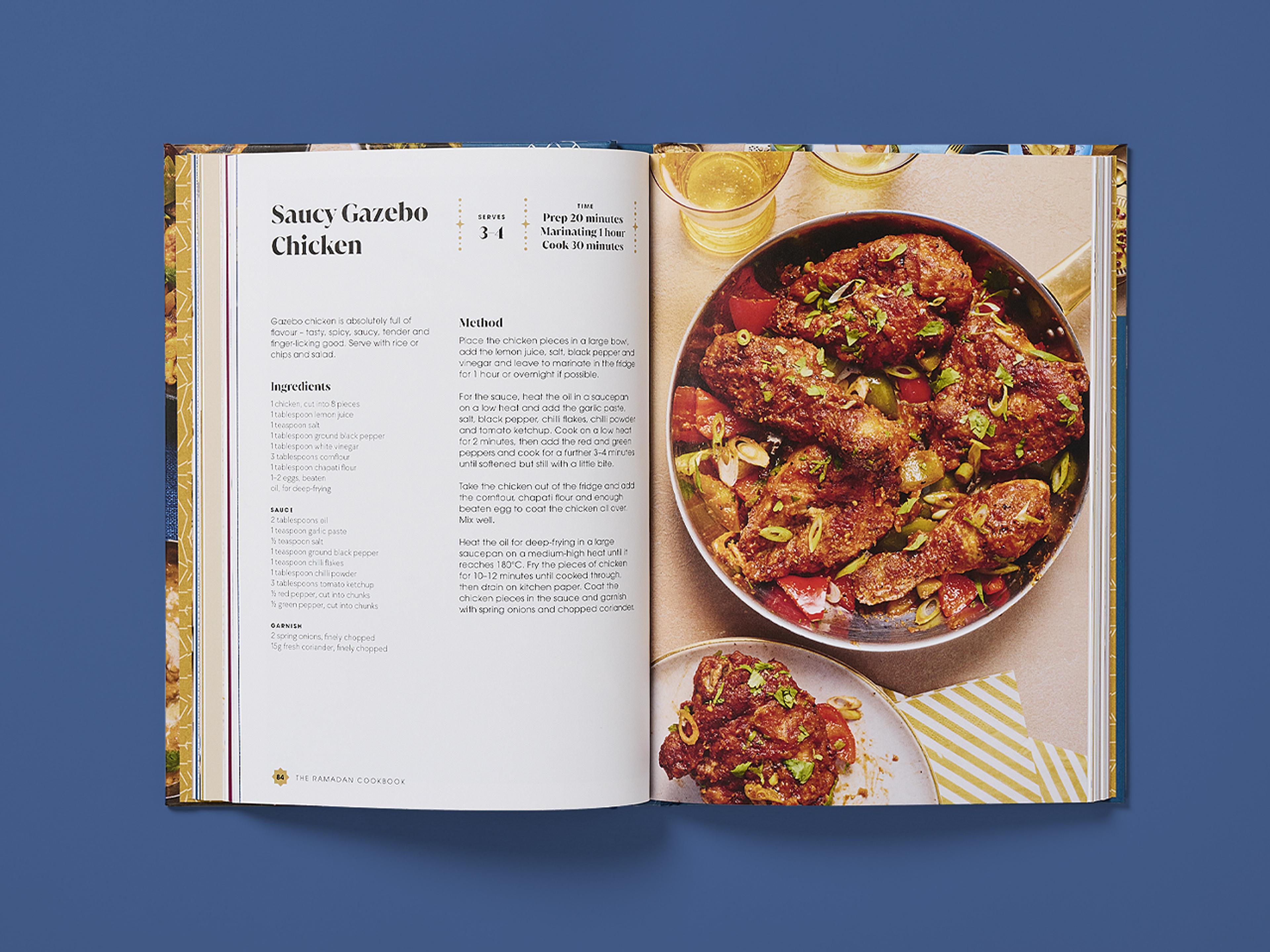Open recipe spread titled “Saucy Gazebo Chicken,” with ingredients and method on the left, and a bowl of spiced chicken pieces garnished with herbs on the right.