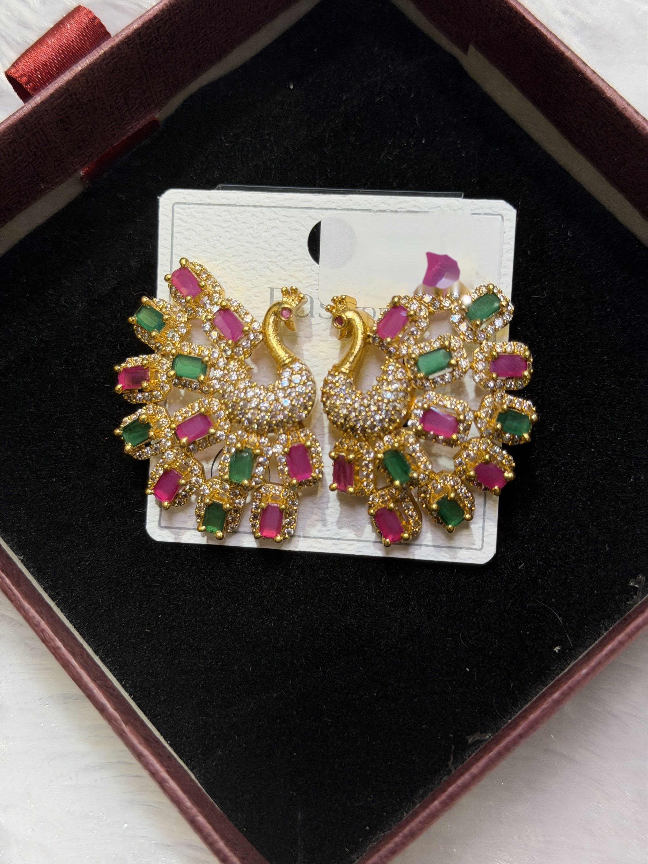 Peacock stone stud earrings