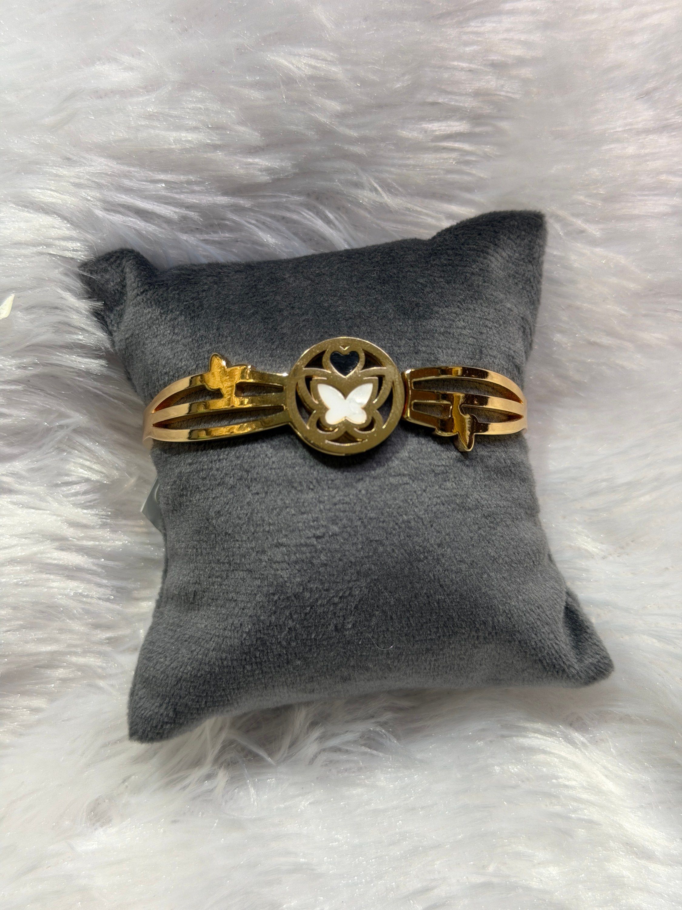 Butterfly medallion cuff