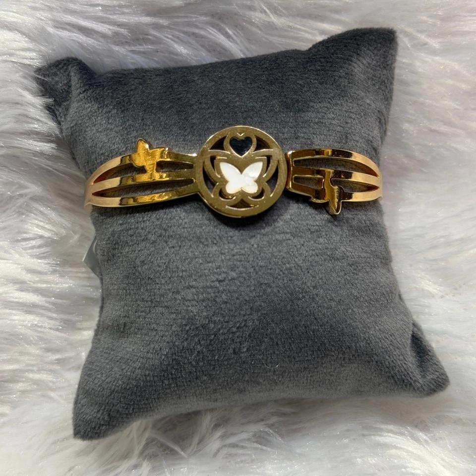 Butterfly medallion cuff