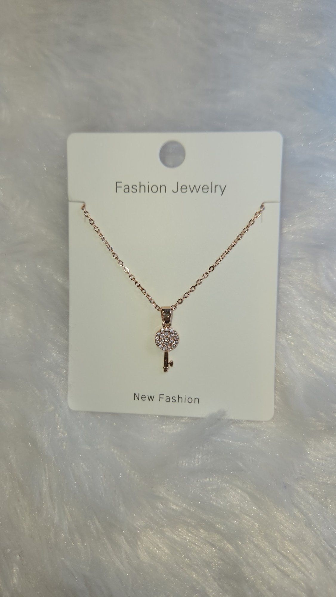 Rose gold key pendant chain *