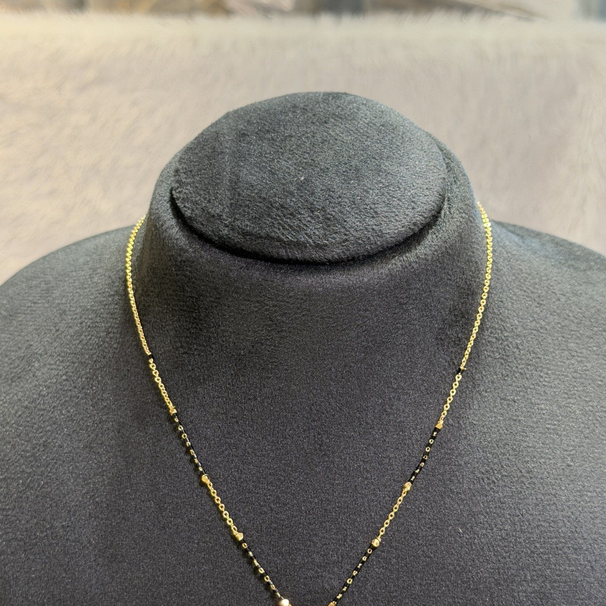 Black bead chain with triangle pendant