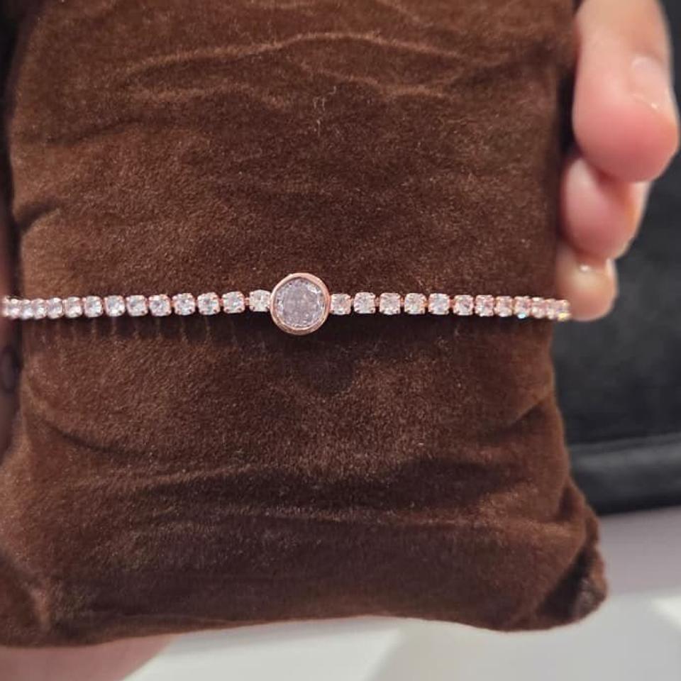 Rose gold tennis bracelet with round charm *