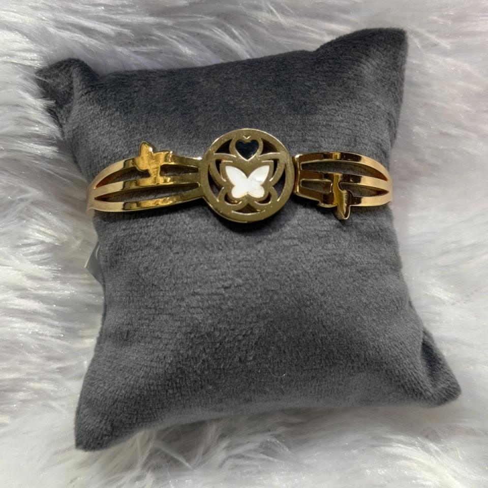 Butterfly medallion cuff