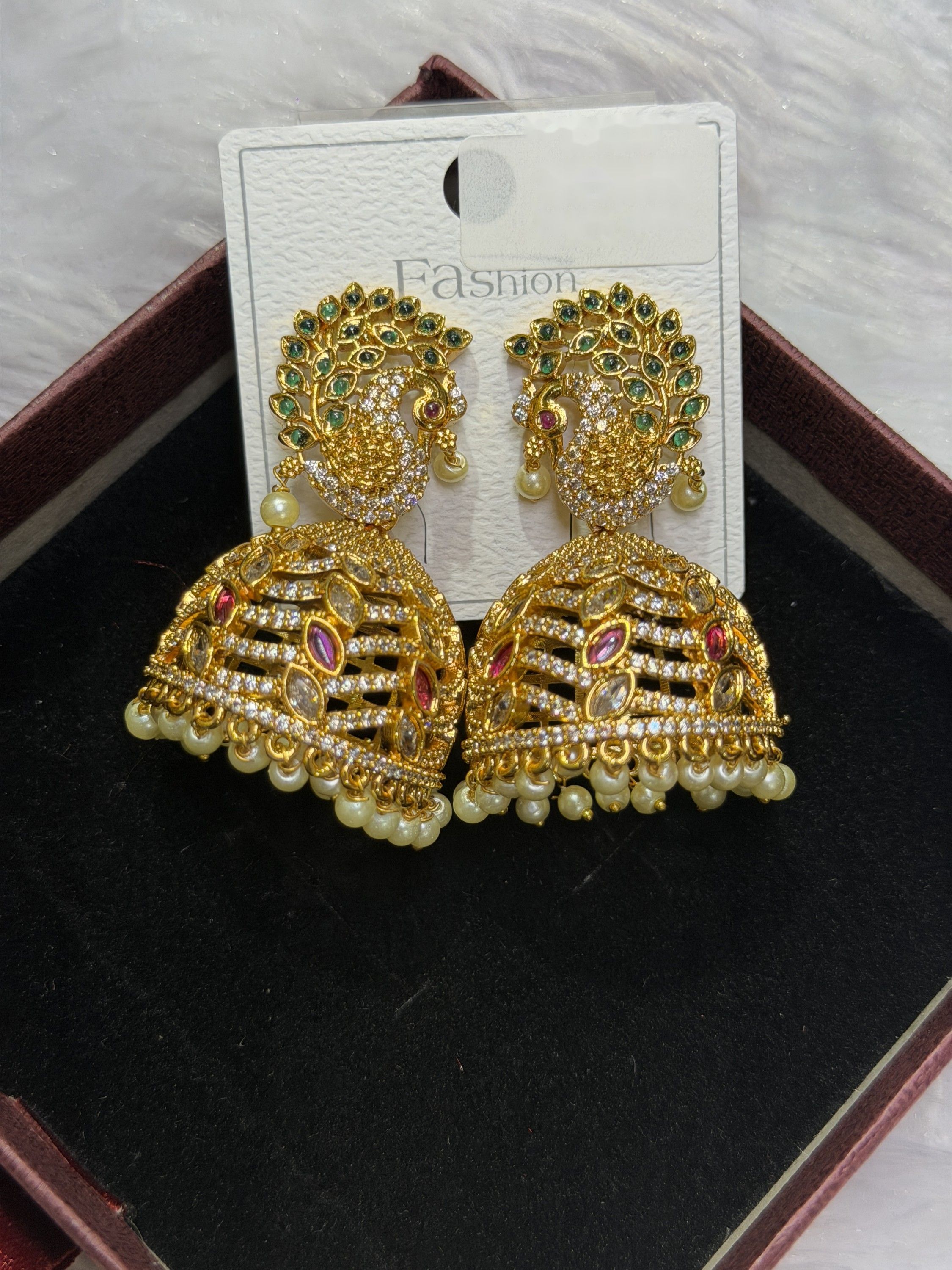 Peacock gold jhumkas