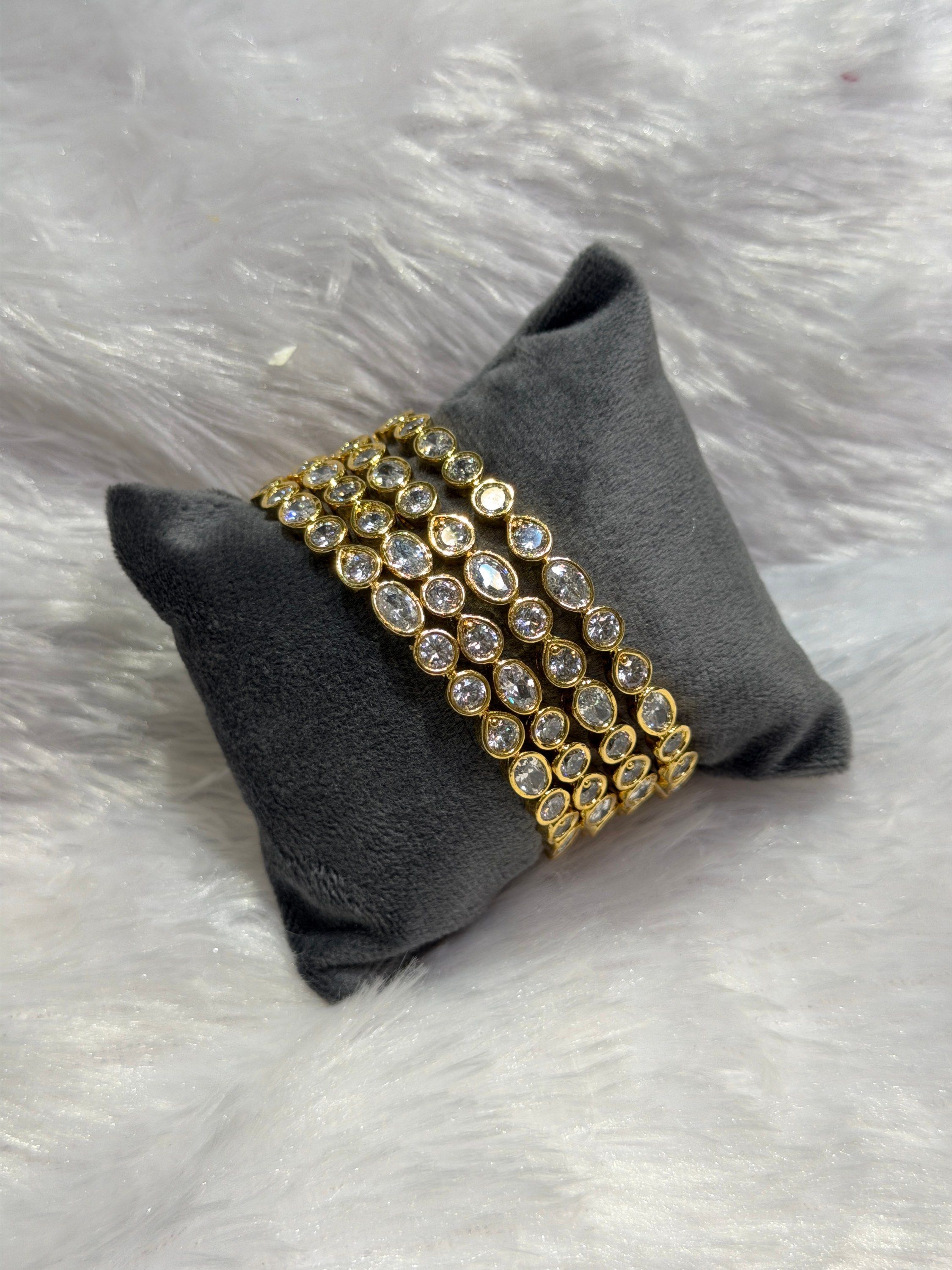 Oval stone layered bangles