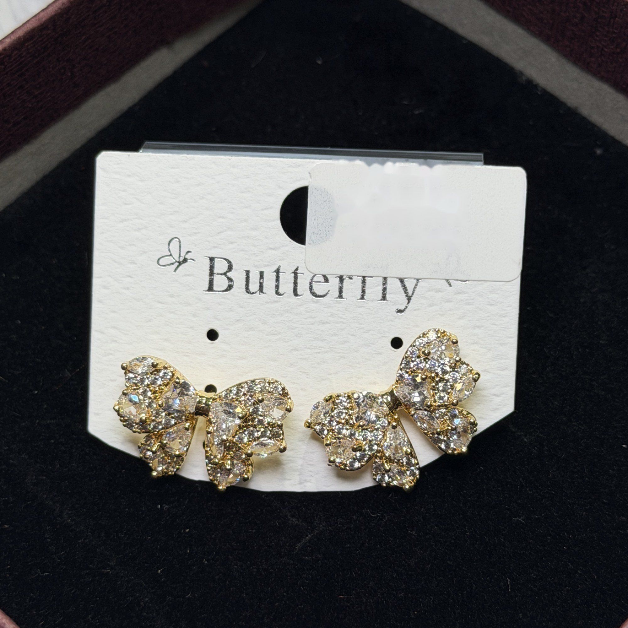 Bow stone stud earrings