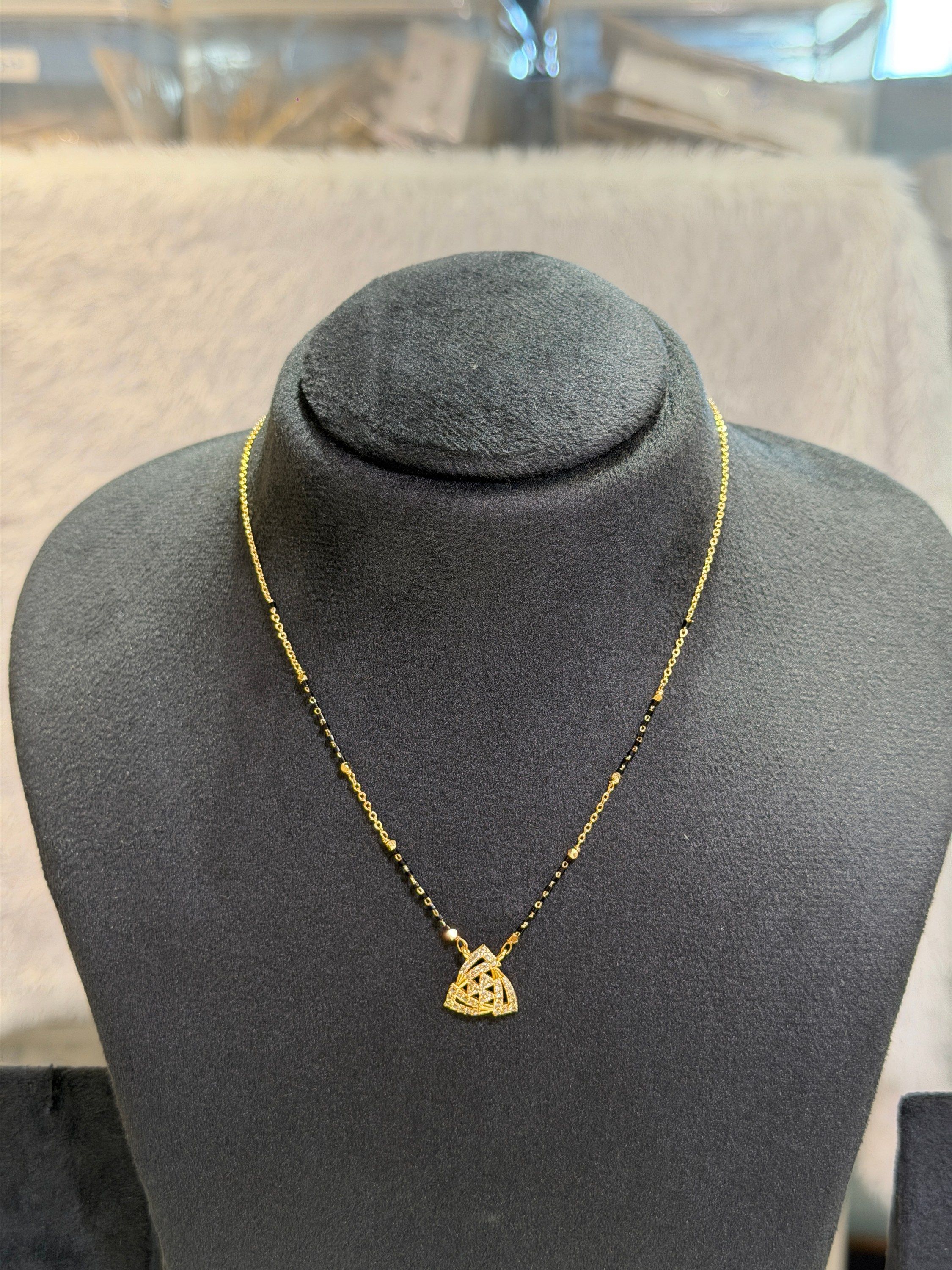 Black bead chain with triangle pendant