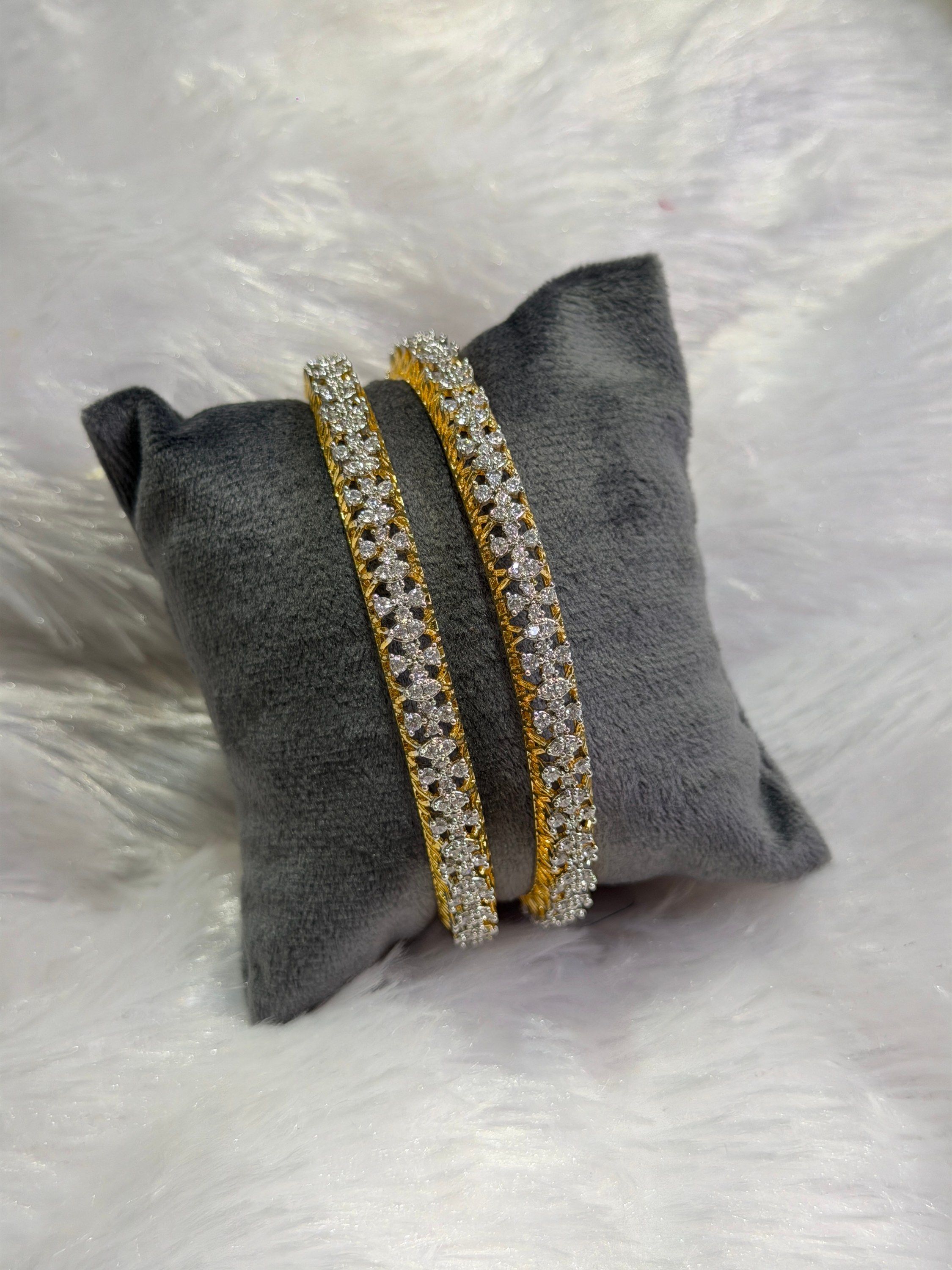 White stone bangle pair
