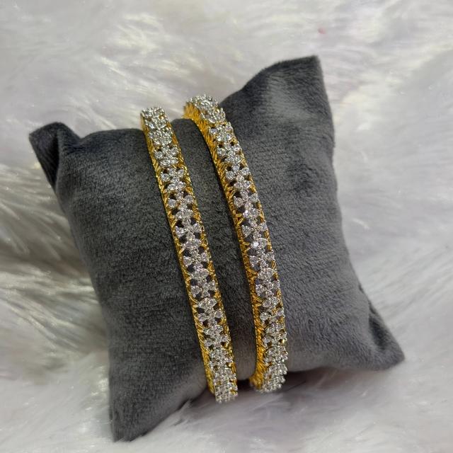 White stone bangle pair