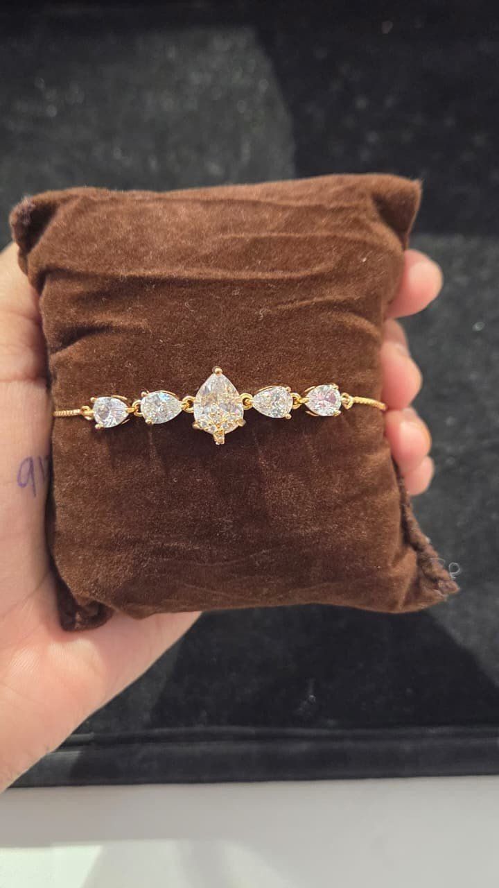 Gold multi-stone drop bracelet *