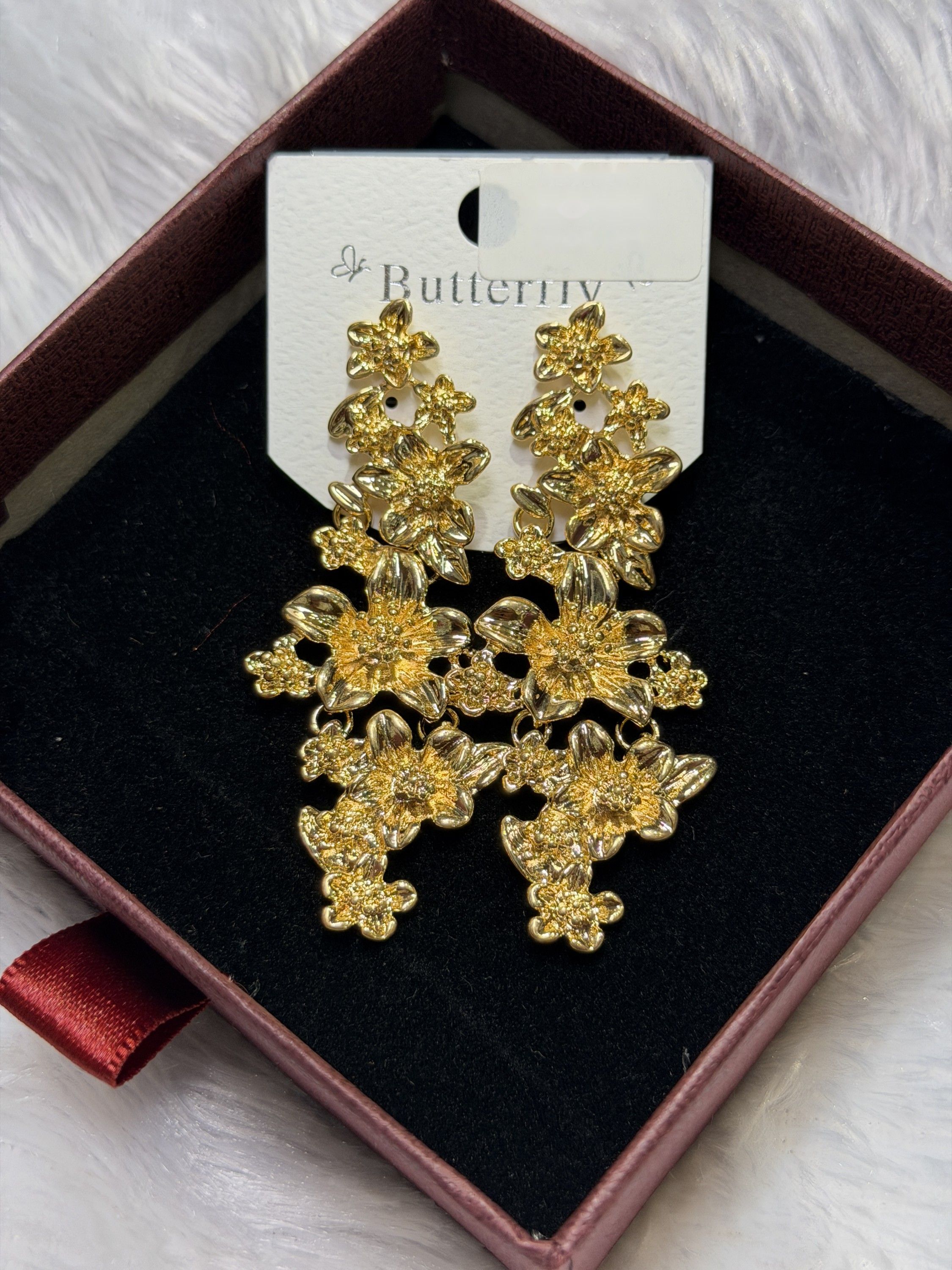 Gold-tone floral cascade earrings