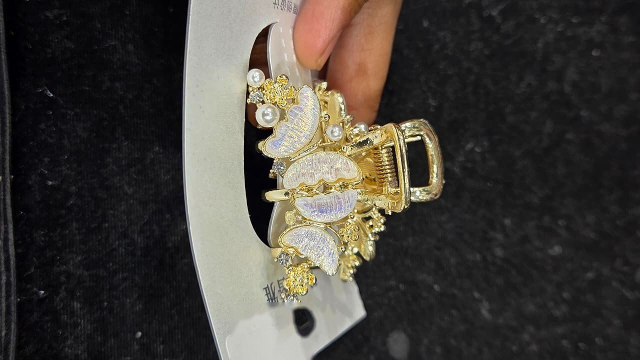 Gold moon and pearl claw clip *
