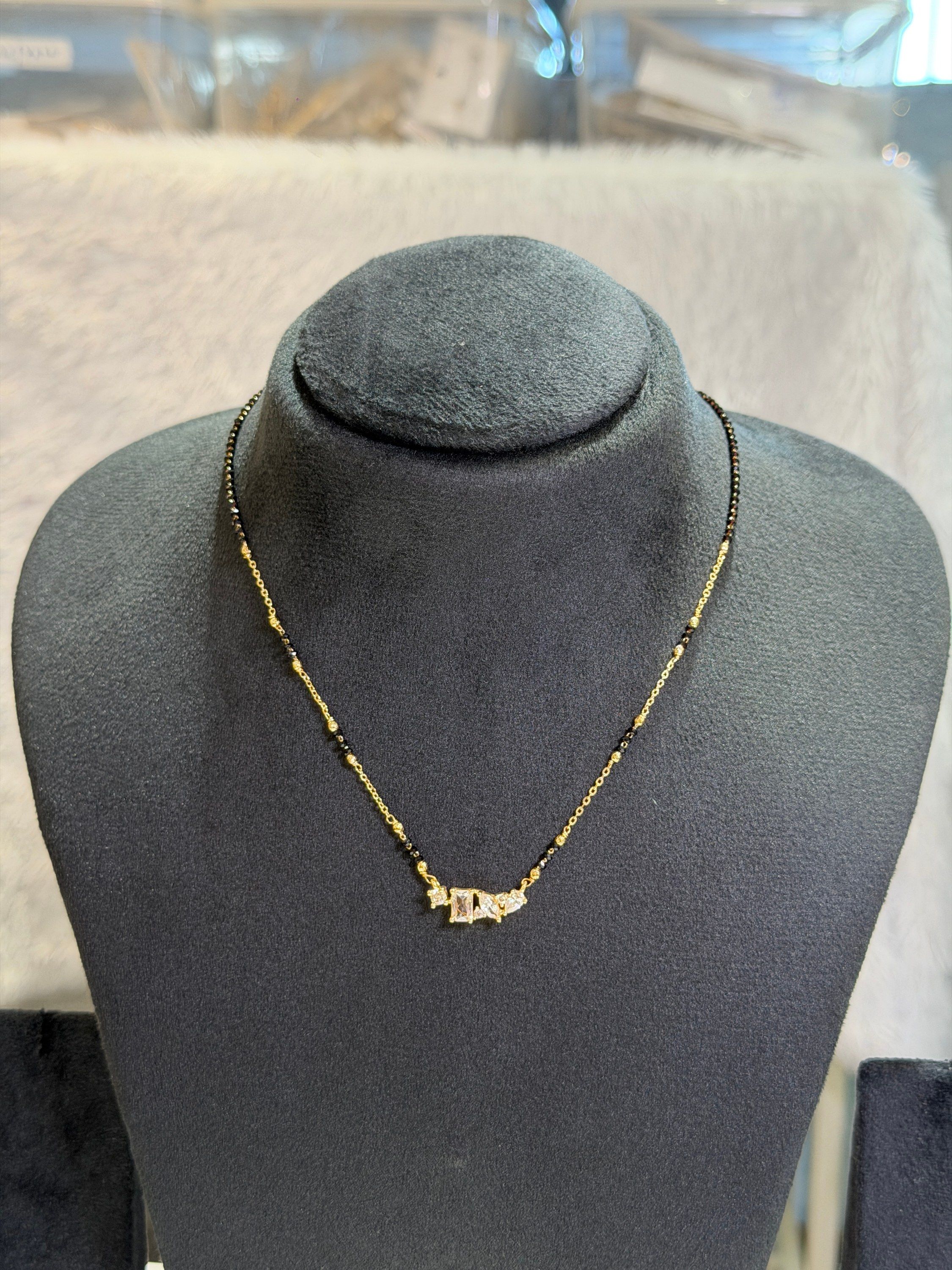 Black bead chain with stone bar pendant
