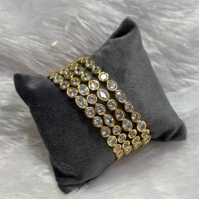 Oval stone layered bangles