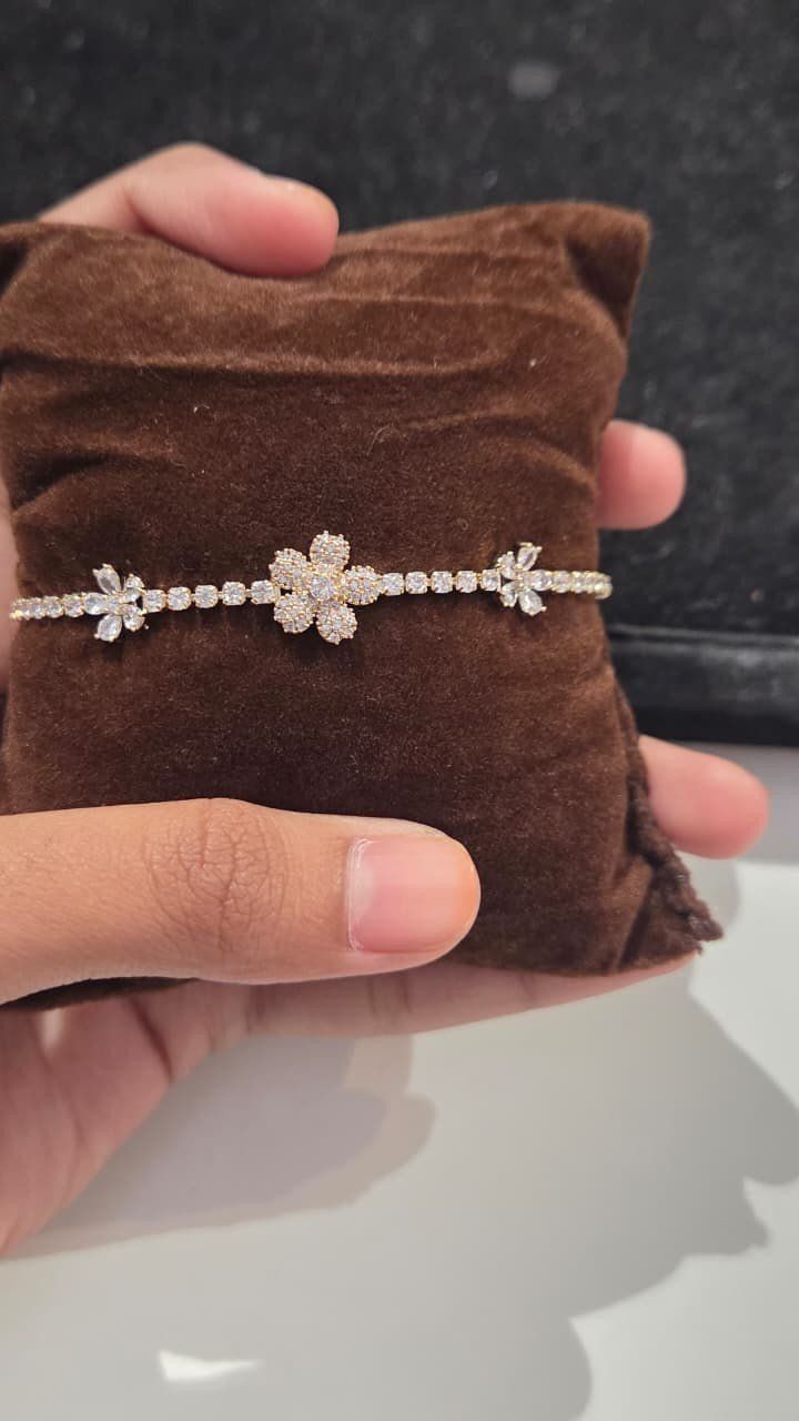 Silver flower tennis bracelet *