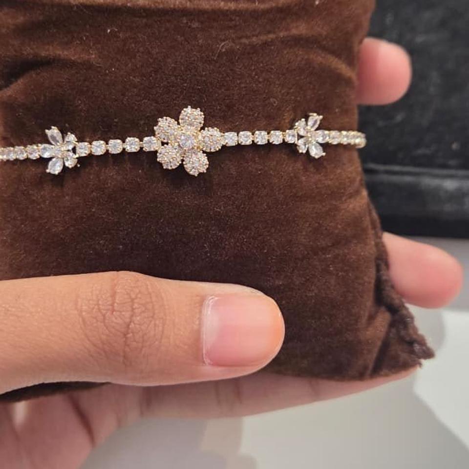 Silver flower tennis bracelet *