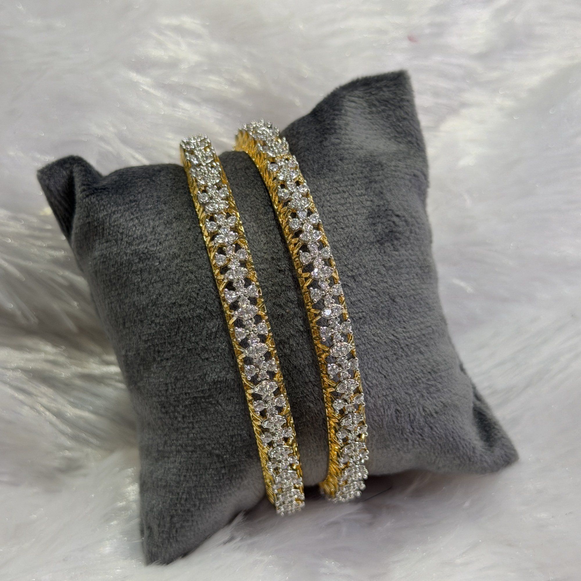 White stone bangle pair