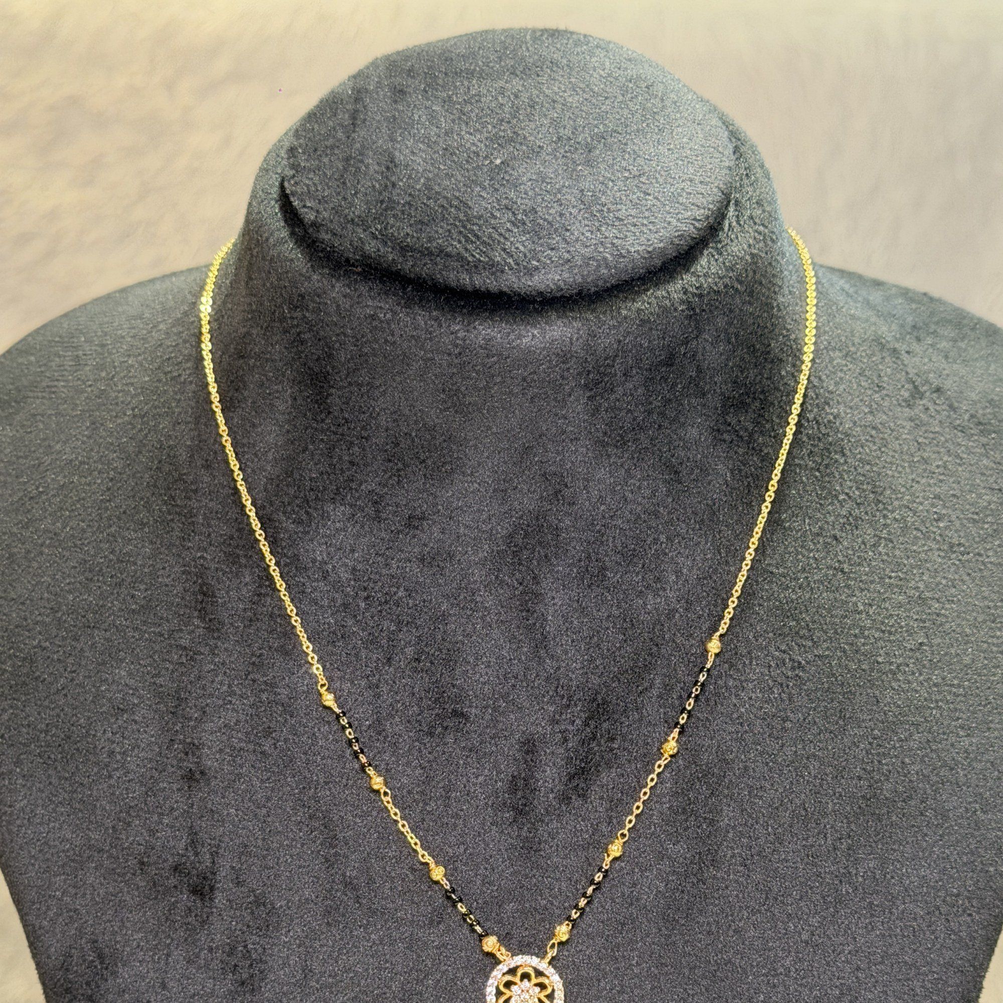 Black bead chain with round pendant