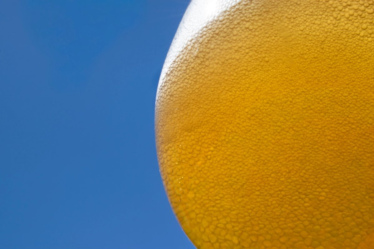 Close-up of a glass of golden beer 