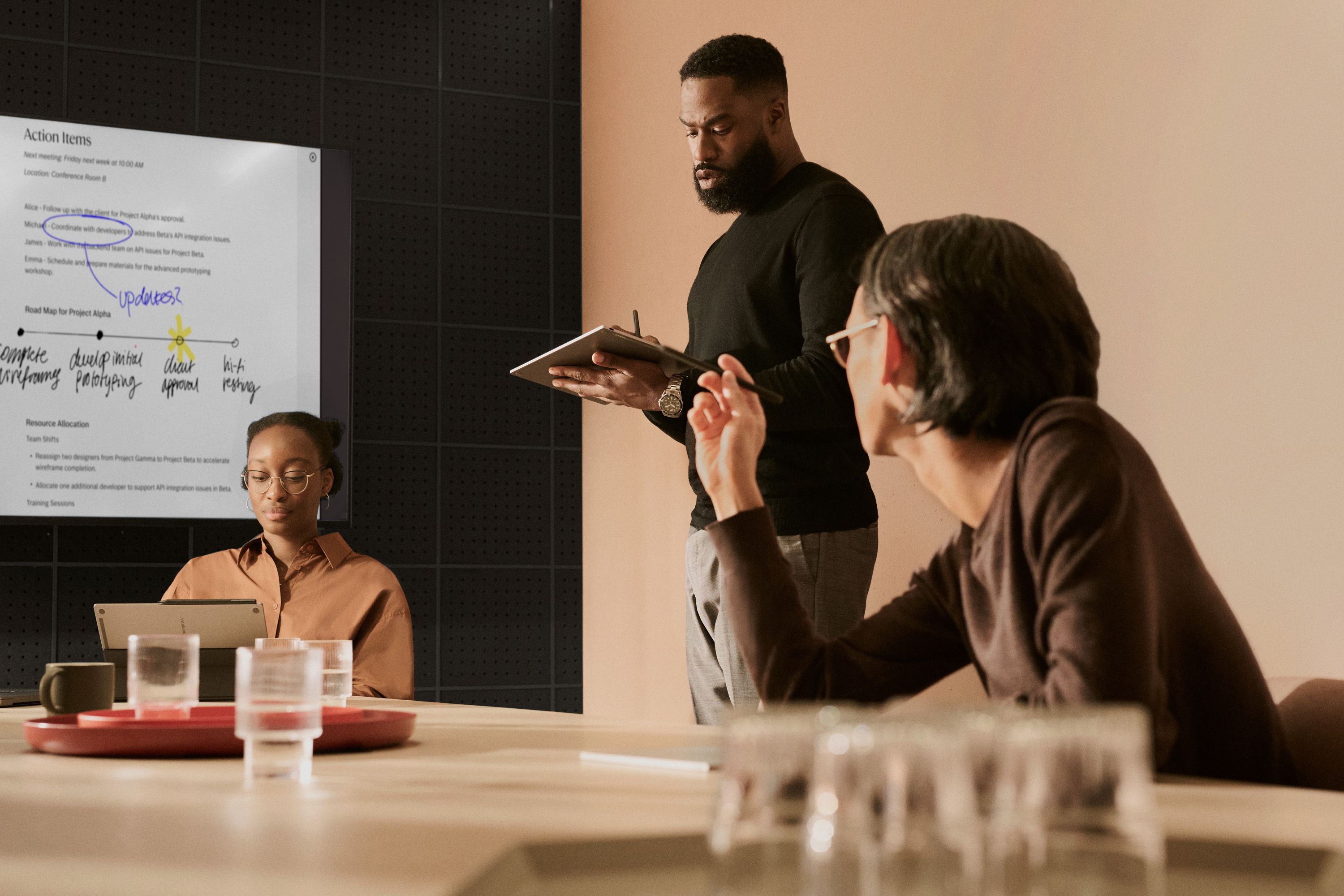 3 people using reMarkable in a meeting