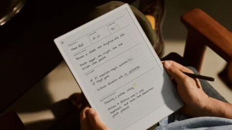 Person holding reMarkable Paper Pro using Peer Review template