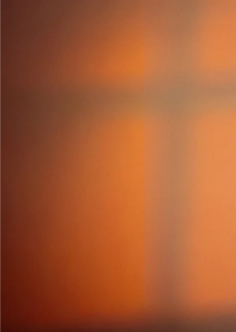 An orange gradient background.