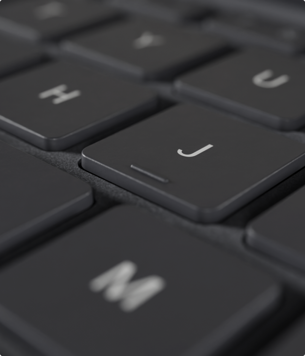 Type Folio close-up with the keys H, J, and M visible.