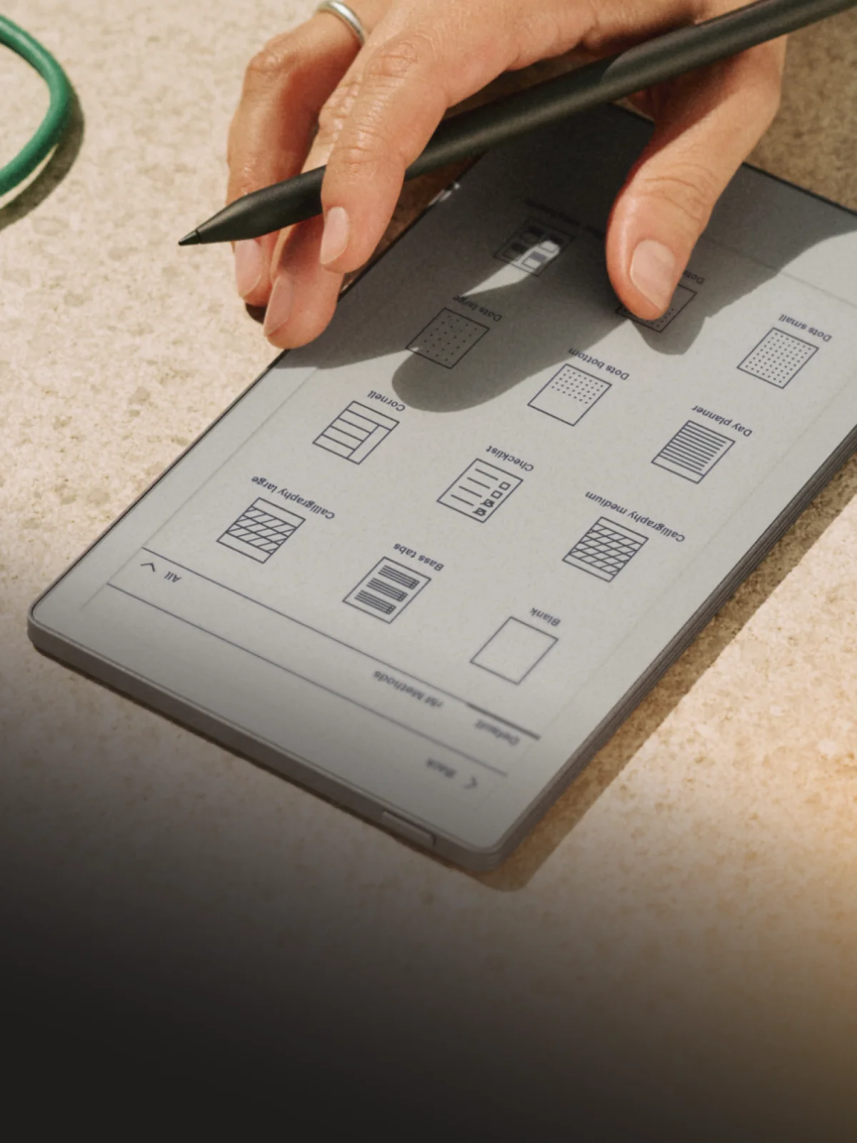 Template picker on the reMarkable Paper Pro Move showing planner and grid layouts