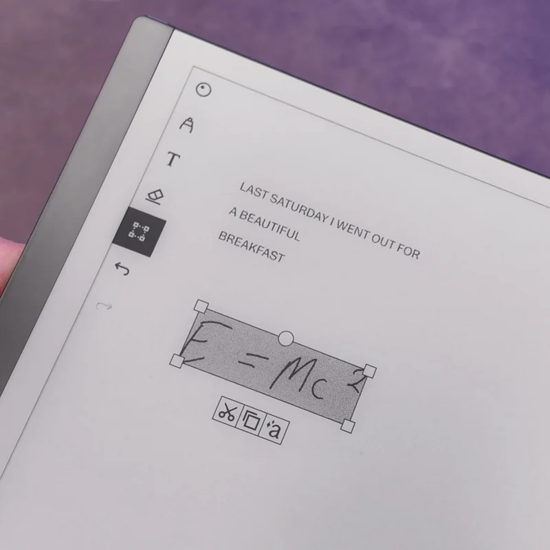reMarkable paper tablet displaying hand-written notes and mathematical equation, E=Mc².