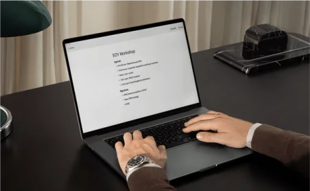 A person sitting at a desk with the reMarkable desktop app that helps you stay focused as you type.
