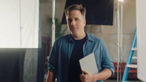 A man holding a reMarkable paper tablet.