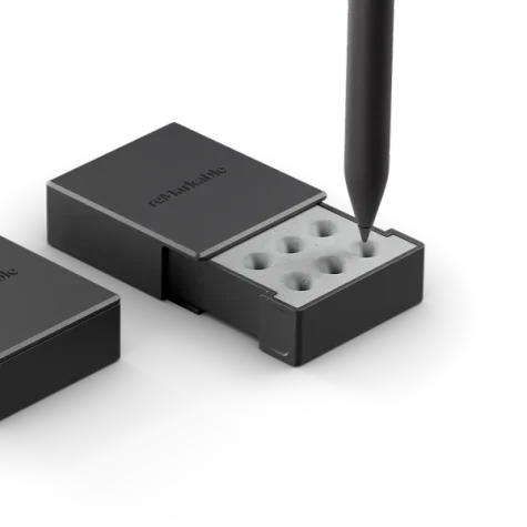 reMarkable Marker tips in a storage case, with a Marker hovering above.