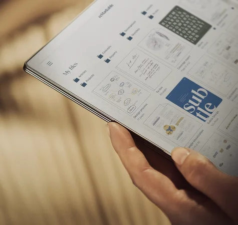 reMarkable Paper Pro tablet displaying files and folders like 'Projects,' 'Reports,' and 'Articles' on tablet home screen.