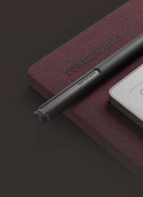 reMarkable Paper Pro Move tablet and Marker on a Book Folio cover in Mosaic Weave.