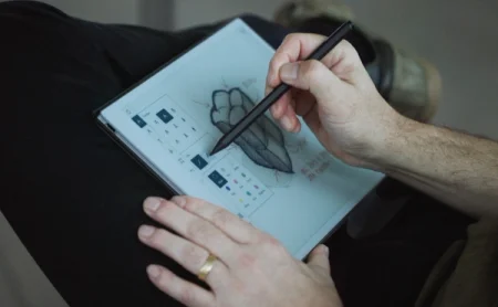 Jakob Lange sketching sofa design on reMarkable paper tablet