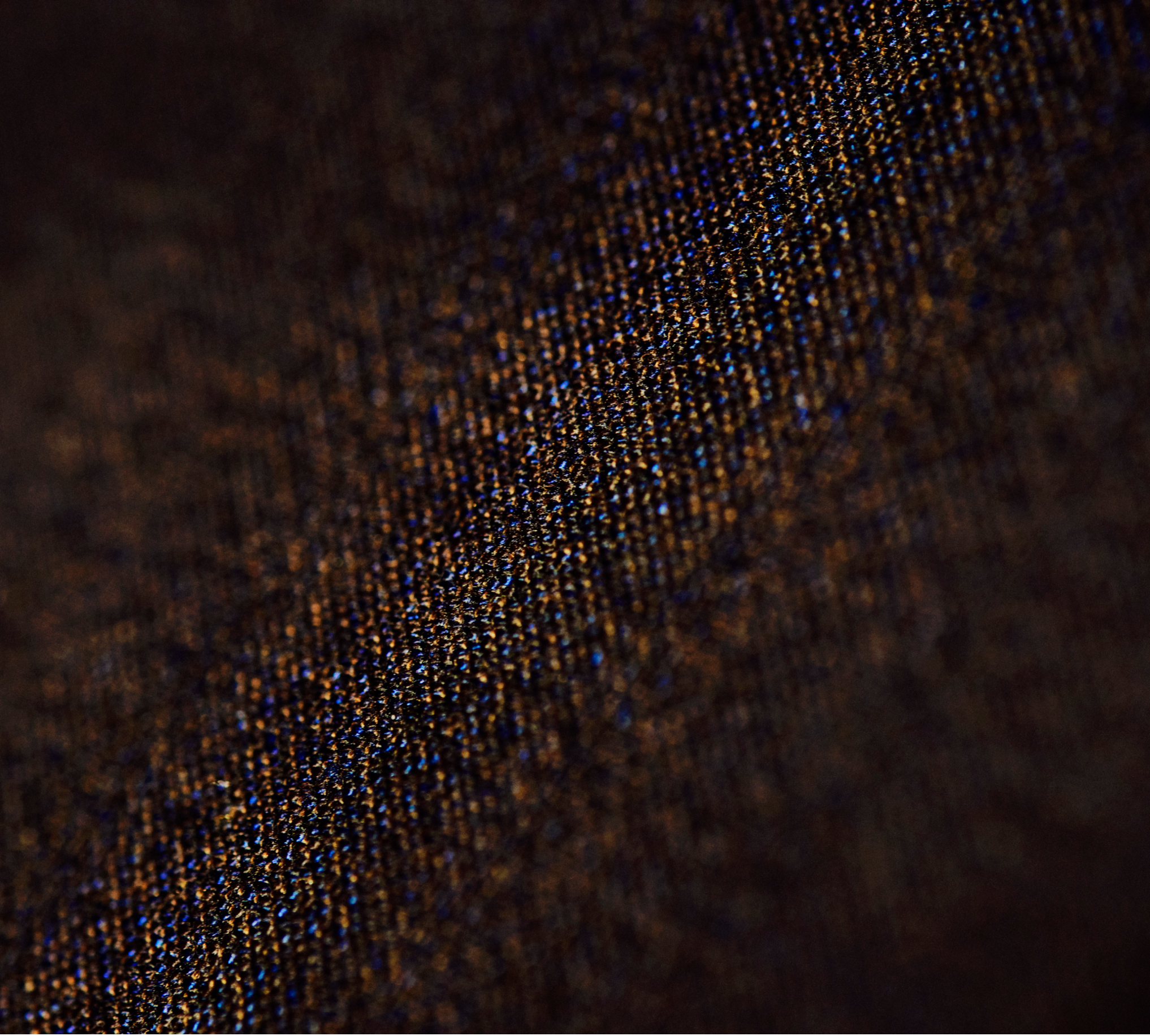 Close-up image of the mosaic weave material for Type Folio.