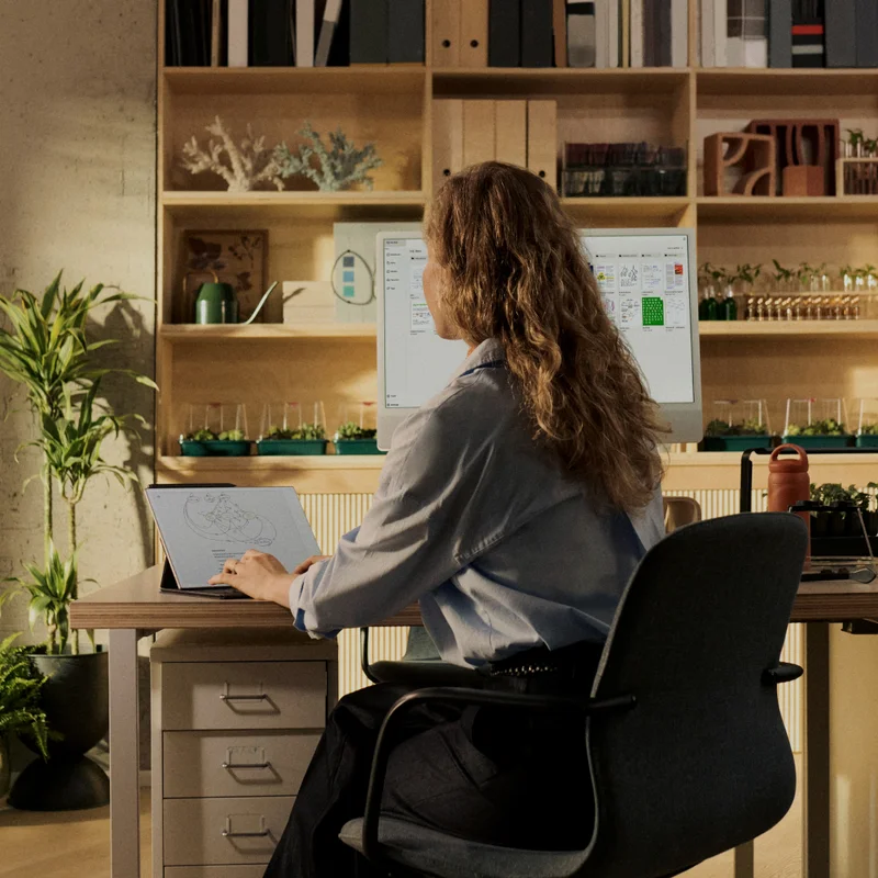 Woman typing on Type Folio for reMarkable Paper Pro