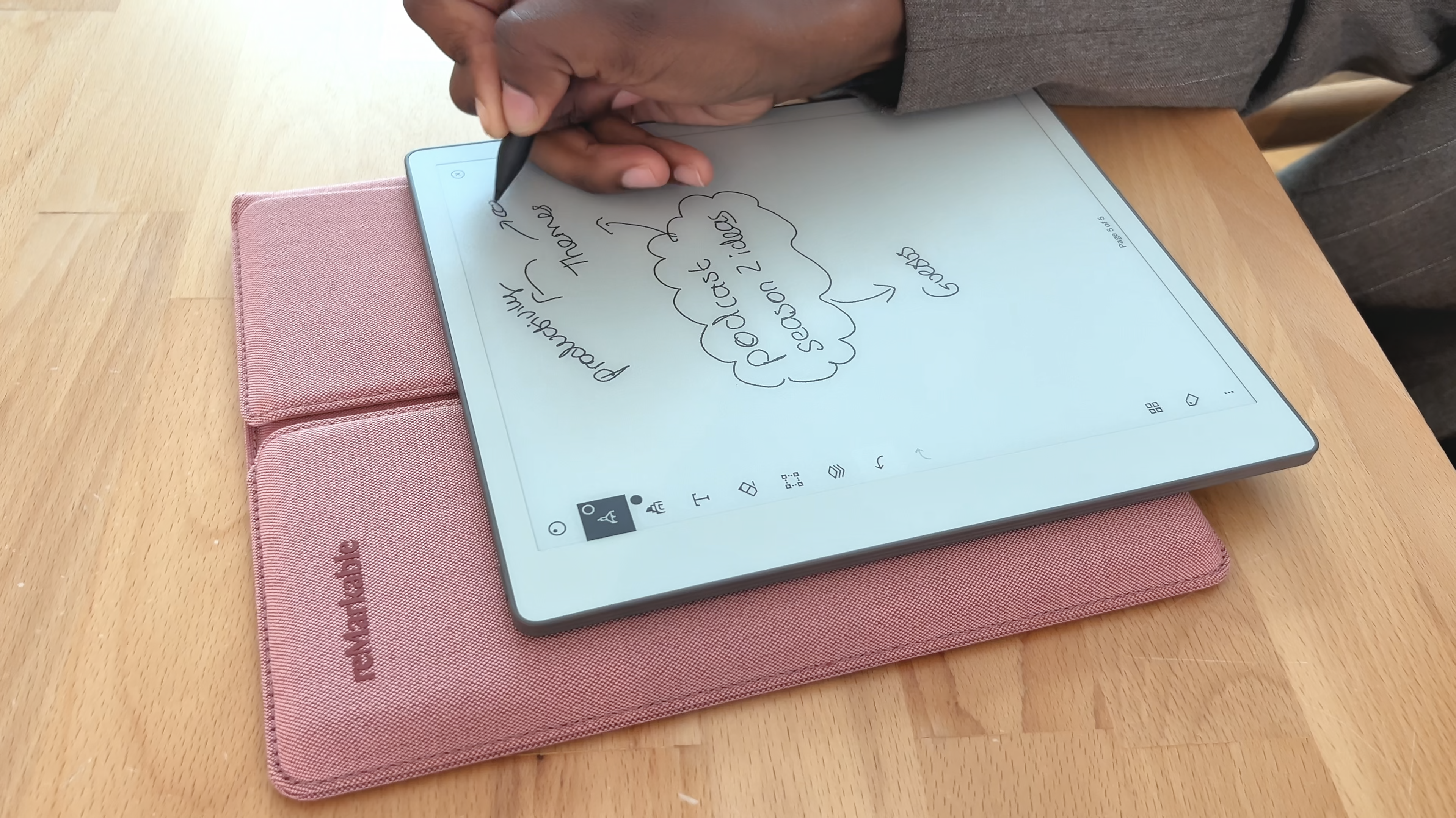 Lydie Kitenge scribbling on her reMarkable Paper Pure tablet.