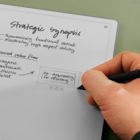 User demonstrating the selection tool on reMarkable to scale or move handwritten text.
