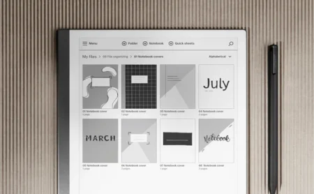 A reMarkable paper tablet displaying various notebook cover designs and the Marker.