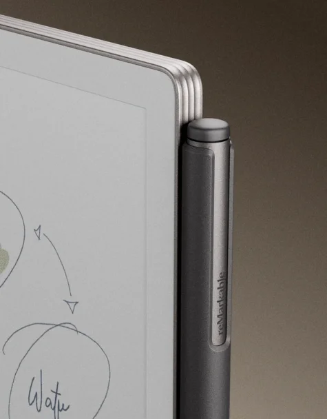 reMarkable Paper Pro Move tablet with the Marker magnetically attached.