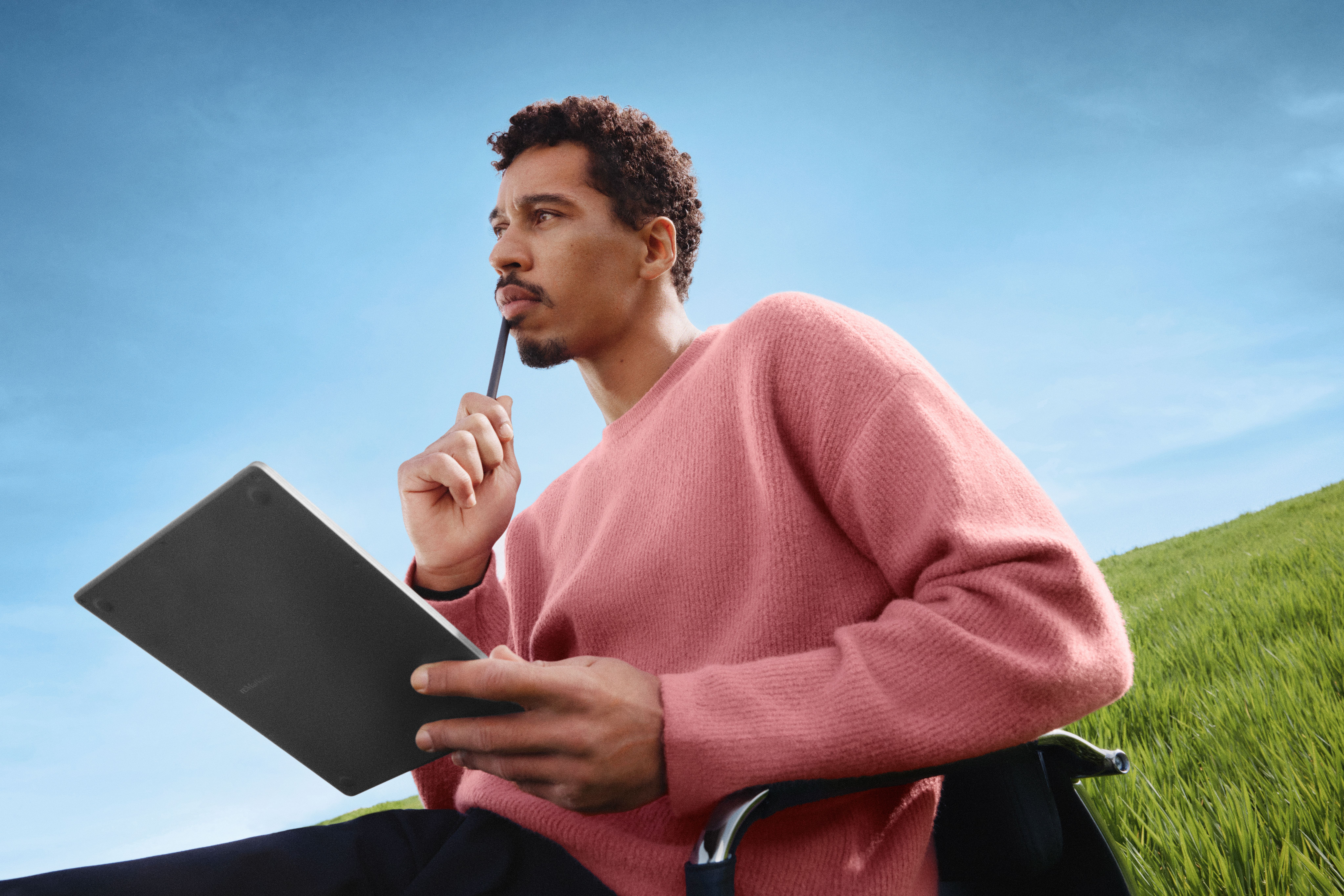 A man thinking while using the reMarkable