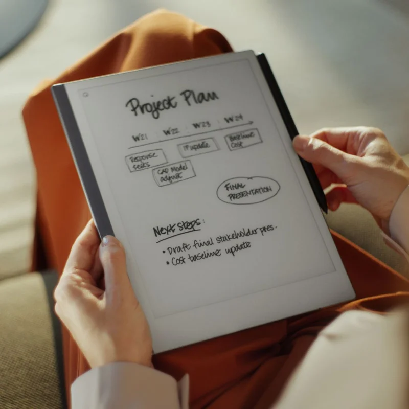 Woman holding reMarkable