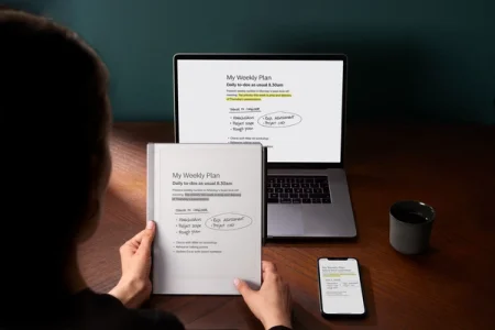 reMarkable paper tablet showing notes next to a laptop and a phone with the same notes.