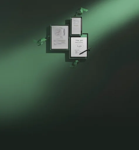 reMarkable Paper Pro, reMarkable Paper Pro Move and reMarkable Paper Pure all gift wrapped in dark green paper.