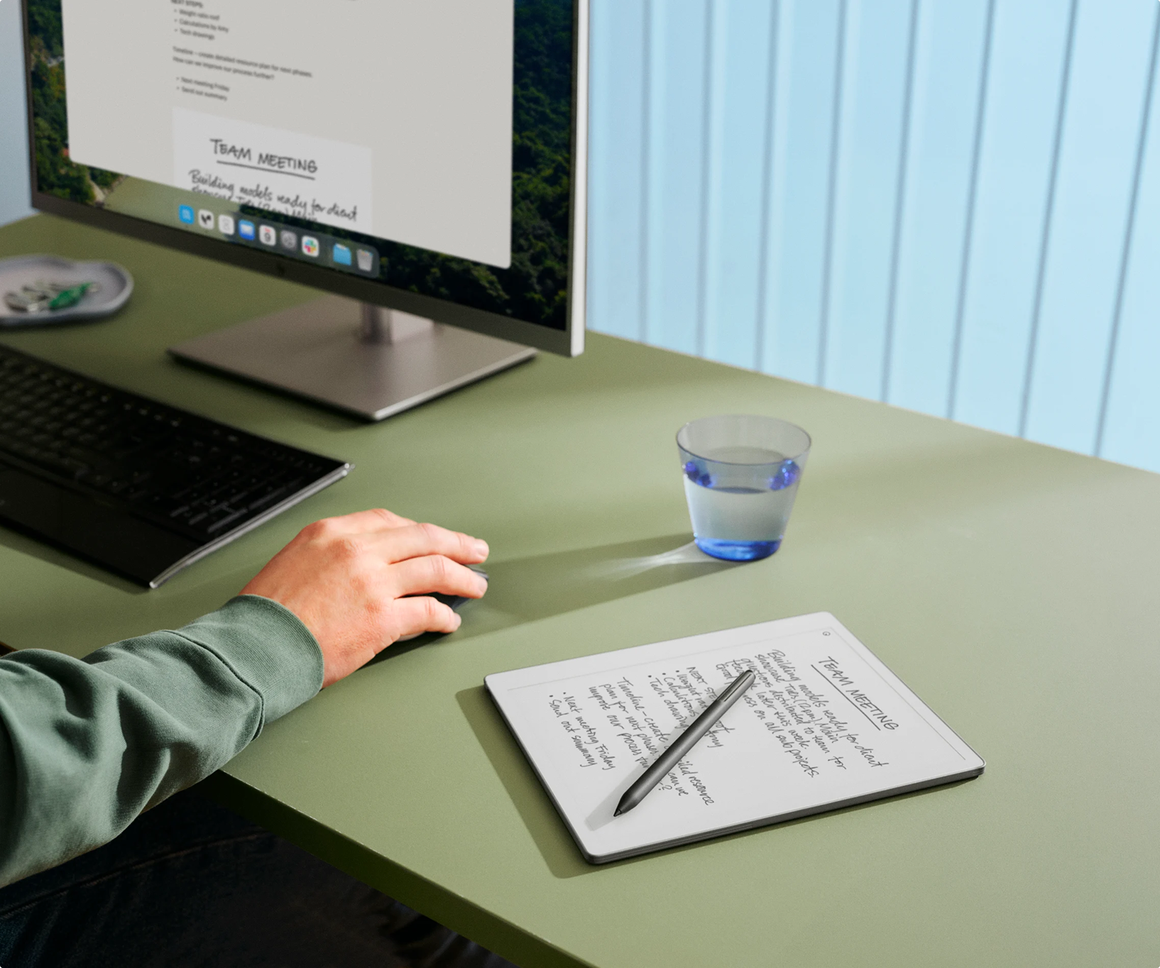 Person editing notes on reMarkable desktop app with reMarkable Paper Pure tablet and Marker Plus on desk.
